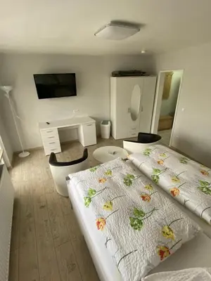 Ein Bett oder Betten in einem Zimmer der Unterkunft Hotel Braunlage