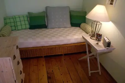 Ein Bett oder Betten in einem Zimmer der Unterkunft Ferienwohnung im Schuhhof