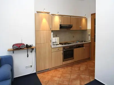 Küche/Küchenzeile in der Unterkunft Apartment in fir with a balcony or a terrace