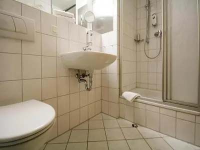 Ein Badezimmer in der Unterkunft Apartment in fir with a balcony or a terrace