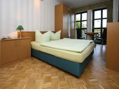 Ein Bett oder Betten in einem Zimmer der Unterkunft Wohnung in Tanne mit einem gemeinsamen Pool