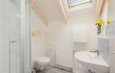 Ein Badezimmer in der Unterkunft Ferienhausdorf Thale