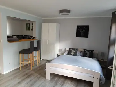 Ein Bett oder Betten in einem Zimmer der Unterkunft Das Ferienhaus am Tiergarten