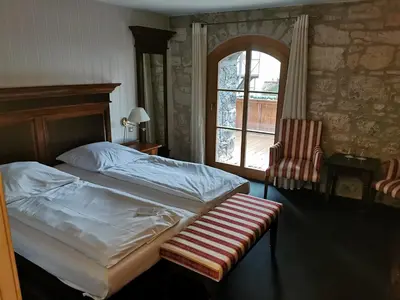 Ein Bett oder Betten in einem Zimmer der Unterkunft Hotel & Spa Wasserschloss Westerburg