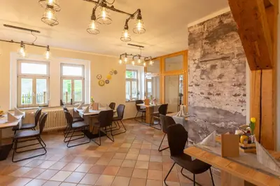 Ein Restaurant oder anderes Speiselokal in der Unterkunft Gasthof Obere Mühle