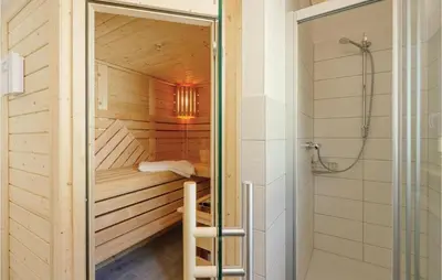 Ein Badezimmer in der Unterkunft Ferienhausdorf Thale