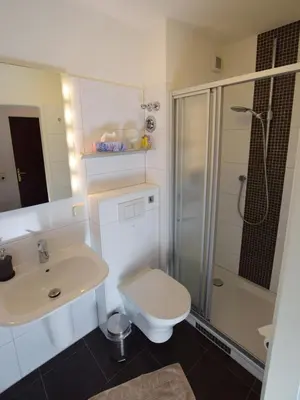 Ein Badezimmer in der Unterkunft Ferienwohnung HEXE mit Komfort ****