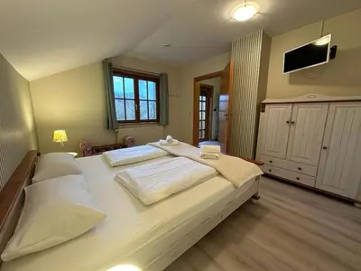 Ein Bett oder Betten in einem Zimmer der Unterkunft Ferienhaus 