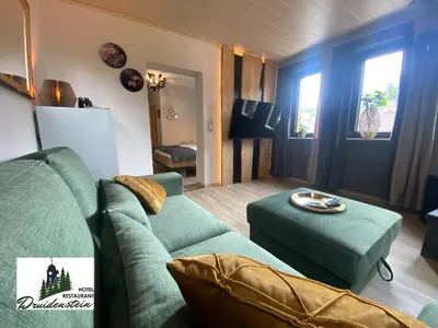 Ein Sitzbereich in der Unterkunft Hotel & Restaurant Druidenstein