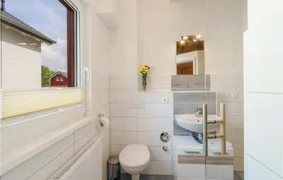 Ein Badezimmer in der Unterkunft Ferienhausdorf Thale