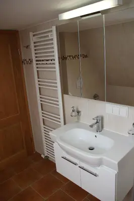 Ein Badezimmer in der Unterkunft Haus der Berge