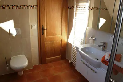 Ein Badezimmer in der Unterkunft Haus der Berge