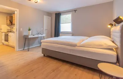 Ein Bett oder Betten in einem Zimmer der Unterkunft Zur Quelle