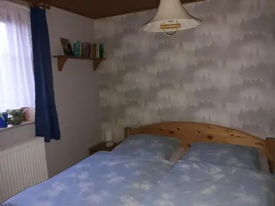 Ein Bett oder Betten in einem Zimmer der Unterkunft Ferienwohnung Klaus