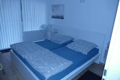 Ein Bett oder Betten in einem Zimmer der Unterkunft Ferienwohnung Reese- Horstmann mit Hallenbad und Sauna, WLAN 