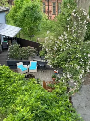 Ein Garten an der Unterkunft Ferienwohnungen am 