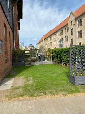 Ein Garten an der Unterkunft Ferienwohnungen am 