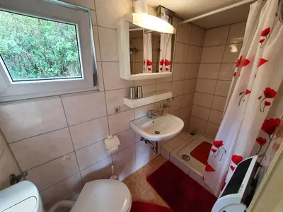 Ein Badezimmer in der Unterkunft Ferienhaus 