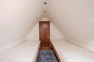 Ein Bett oder Betten in einem Zimmer der Unterkunft Schierke Ferienwohnung Hirschrudel
