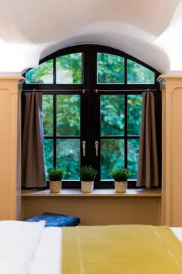 Ein Bett oder Betten in einem Zimmer der Unterkunft Ferienwohnung Burgkaiser