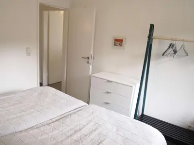 Ein Bett oder Betten in einem Zimmer der Unterkunft Ferienwohnung GrünWald