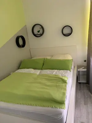 Ein Bett oder Betten in einem Zimmer der Unterkunft Hahnenklee Ferienpark 6-244