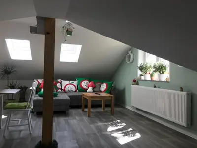 Ein Sitzbereich in der Unterkunft Ferienwohnung Apfeltraum