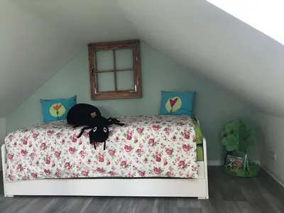 Ein Bett oder Betten in einem Zimmer der Unterkunft Ferienwohnung Apfeltraum