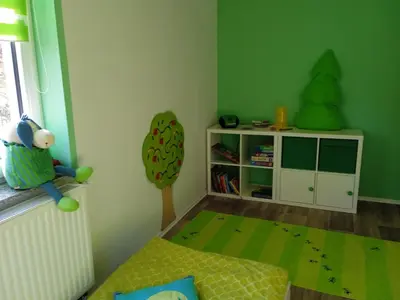 Ein Bett oder Betten in einem Zimmer der Unterkunft Ferienwohnung Apfeltraum