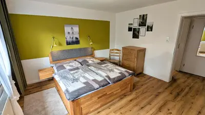 Ein Bett oder Betten in einem Zimmer der Unterkunft Ferienwohnung Goslar - Georgenberg / Entspannen im Harz / Mittendrin