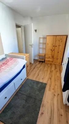 Ein Bett oder Betten in einem Zimmer der Unterkunft Ferienwohnung Goslar - Georgenberg / Entspannen im Harz / Mittendrin