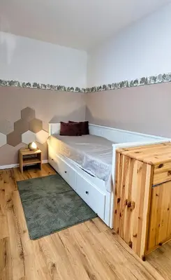 Ein Bett oder Betten in einem Zimmer der Unterkunft Ferienwohnung Goslar - Georgenberg / Entspannen im Harz / Mittendrin