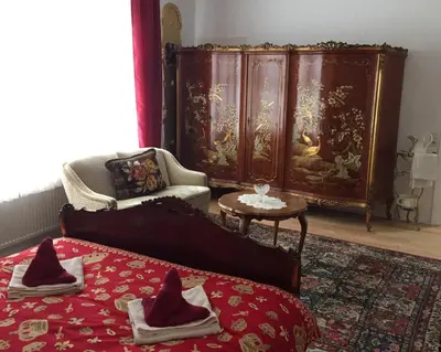 Ein Bett oder Betten in einem Zimmer der Unterkunft Königreich Romkerhall