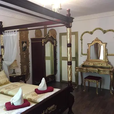 Ein Bett oder Betten in einem Zimmer der Unterkunft Königreich Romkerhall