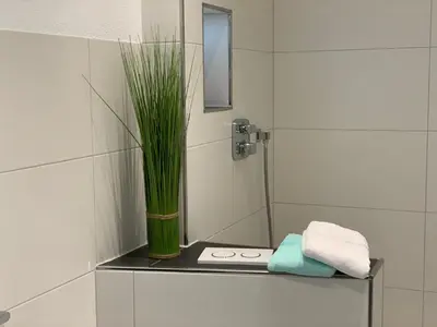 Ein Badezimmer in der Unterkunft 3-Sterne Komfortferienwohnung Köhnke 4 - [#122259]