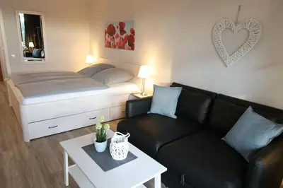 Ein Bett oder Betten in einem Zimmer der Unterkunft Seaside Appartement 341 Vier Jahreszeiten