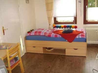 Ein Bett oder Betten in einem Zimmer der Unterkunft Haus Gertrud
