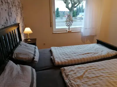 Ein Bett oder Betten in einem Zimmer der Unterkunft Wanderglück