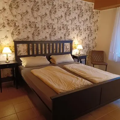 Ein Bett oder Betten in einem Zimmer der Unterkunft Wanderglück