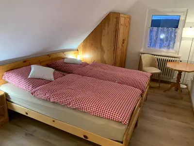Ein Bett oder Betten in einem Zimmer der Unterkunft Ferienhaus Lilo