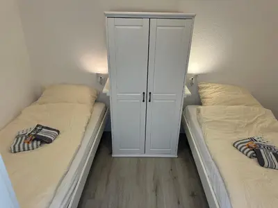 Ein Bett oder Betten in einem Zimmer der Unterkunft Ferienwohnung Relax 2