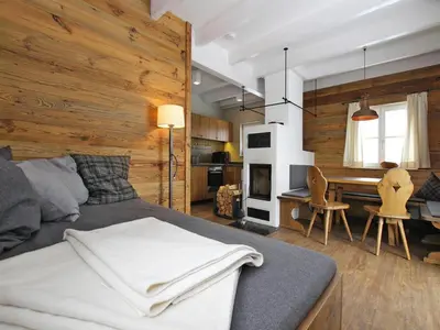 Ein Sitzbereich in der Unterkunft Semi-detached houses, turf house
