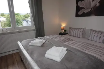 Ein Bett oder Betten in einem Zimmer der Unterkunft Ferienhaus Hundertmorgenfeld Wo2