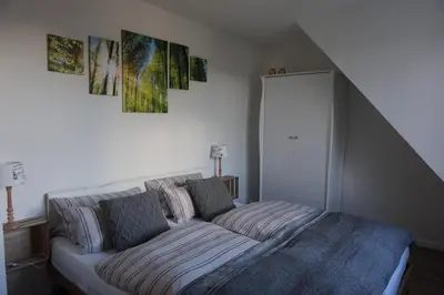 Ein Bett oder Betten in einem Zimmer der Unterkunft Ferienhaus Hundertmorgenfeld Wo 3