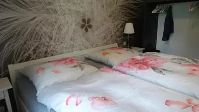Ein Bett oder Betten in einem Zimmer der Unterkunft Buntspecht