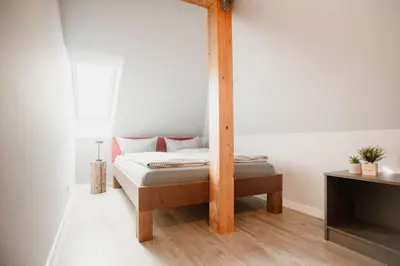 Ein Bett oder Betten in einem Zimmer der Unterkunft KaiserBlick