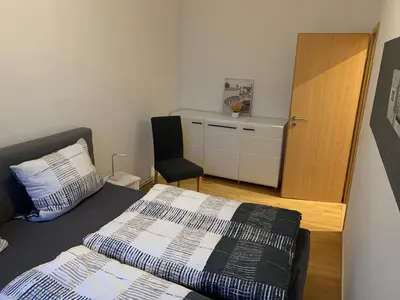 Ein Bett oder Betten in einem Zimmer der Unterkunft Ferienwohnung Rico