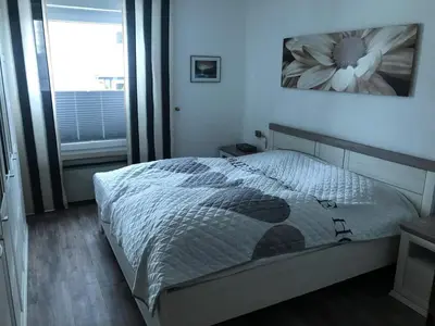 Ein Bett oder Betten in einem Zimmer der Unterkunft Ferienwohnungen Kolsdorf A