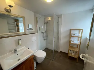 Ein Badezimmer in der Unterkunft Apartment mit Balkon No4