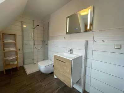 Ein Badezimmer in der Unterkunft Apartment mit Balkon No5